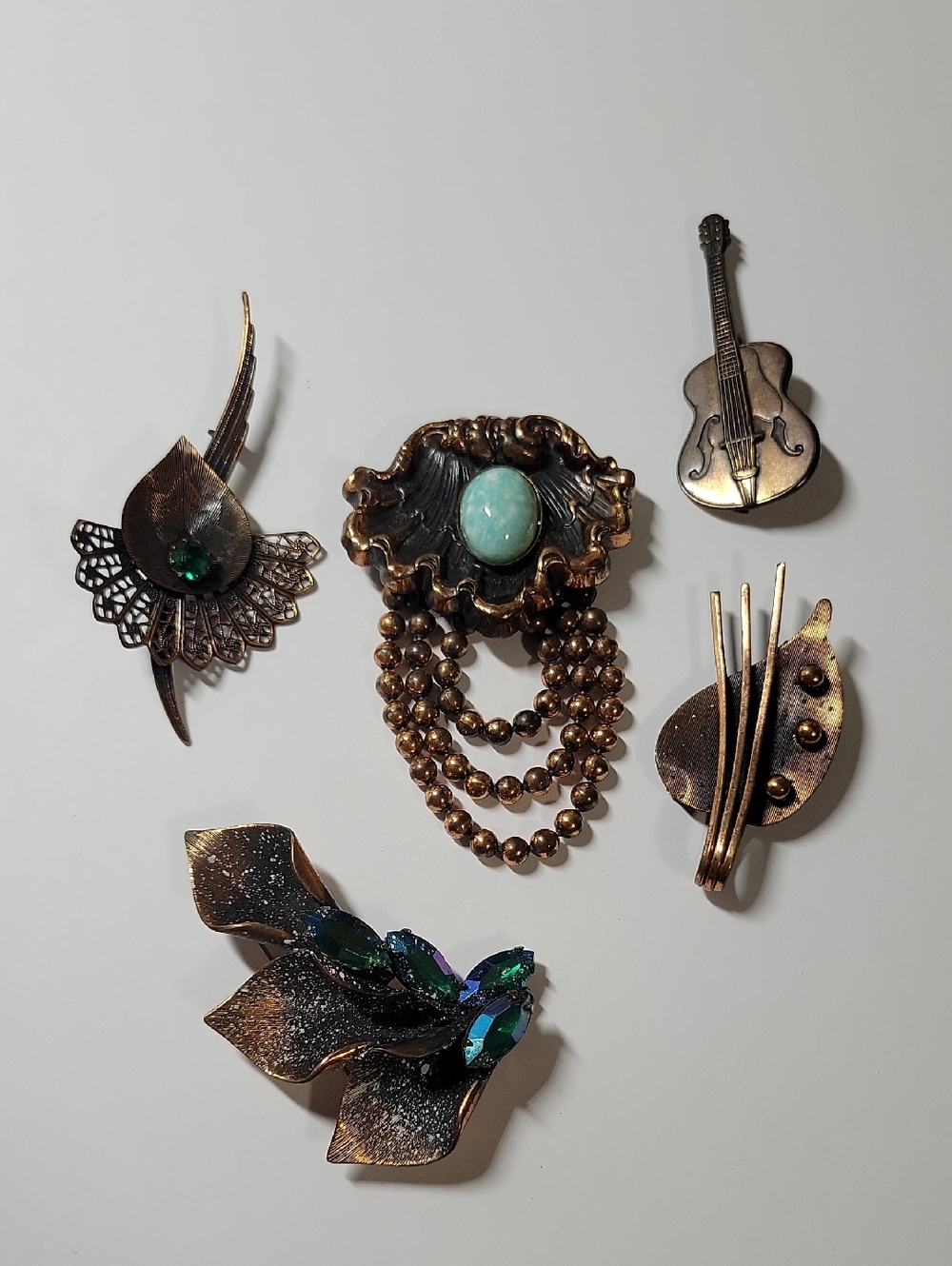 Vintage-Style Brass Tone Brooch with Teal Cabochon Accent